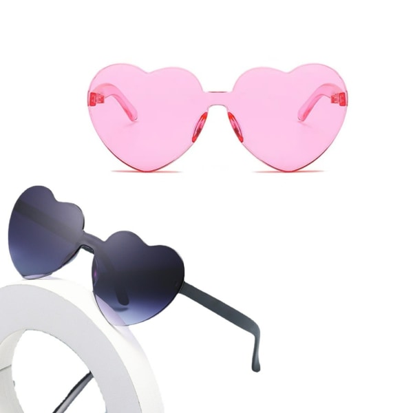 2 stycken persikahjärta solglasögon kärlekssolglasögon geléfärgade hjärtformade glasögon i ett stycke ramlösa bländande färgglasögon