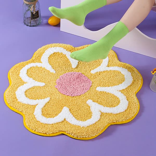 Sød, blød, blomsterformet mikrofiber bademåtte, der absorberer vand