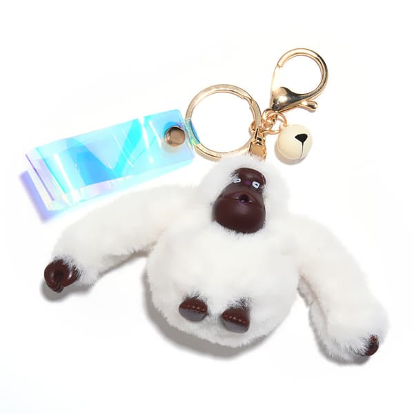 Vaaleanharmaa luova söpö gorilla-pehmoleluavainperä