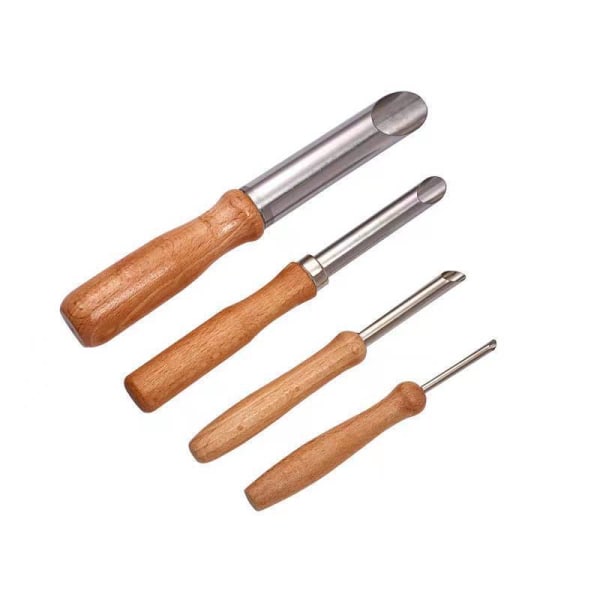 Pieces of pottery and sculpture ceramic tools stainless steel and wood round clay hole cutters