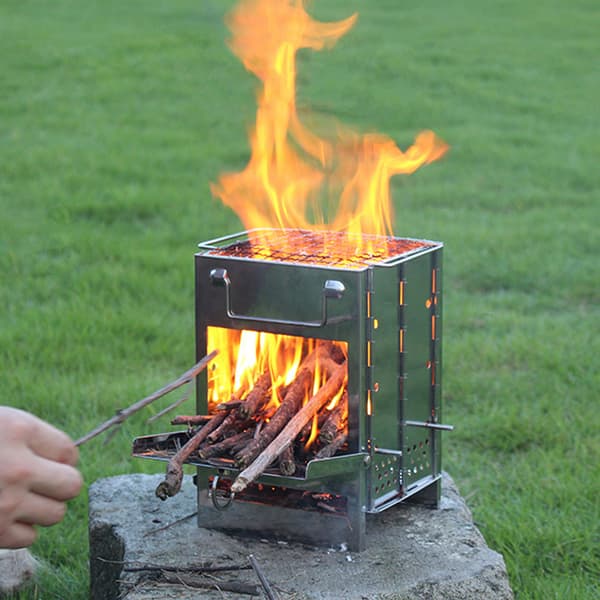 Integrerad hopfällbar vedspis Utomhus camping BBQ-grill Rostfritt stål plugg stifttyp