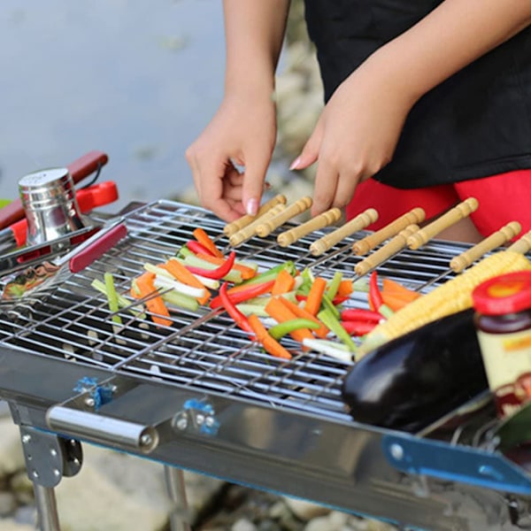 10 stk. grillspyd med træhåndtag i rustfrit stål