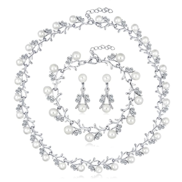 Perlehalskædesæt, legeret med diamantsæt halskæde, øreringe og tredelt armbånd, der matcher en festkjole