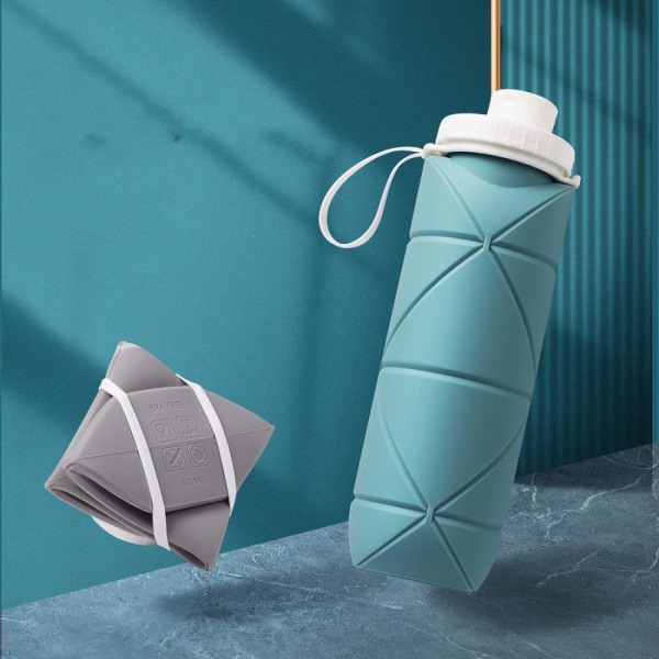 Blå special hopfällbar vattenflaska läckagesäker ventil hopfällbar sportvattenflaska