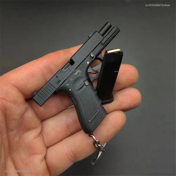 2023 högkvalitativ metallpistolpistol Miniatyrmodell Legering Empire 1:3 Glock Shell Ejection Keychain Model Ornament 3