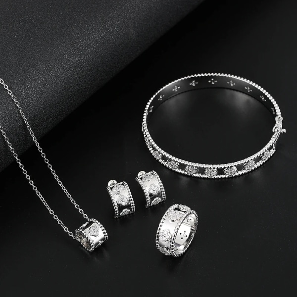 Kvinnors zirkonarmband Ring Örhänge Hänge Set med fyra högkvalitativa smycken Set Klassisk växt Blomma Modesmycken 6 TH81200-Platinum