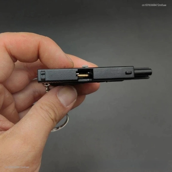 2023 högkvalitativ metallpistolpistol Miniatyrmodell Legering Empire 1:3 Glock Shell Ejection Keychain Model Ornament 3