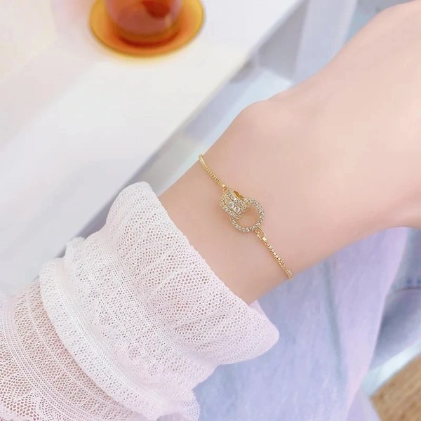 Klassisk design Ring interlocki guldfärgade berlockarmband för kvinnors zirkon Enkelt litet midjearmband Elegant dagligt armband Gold