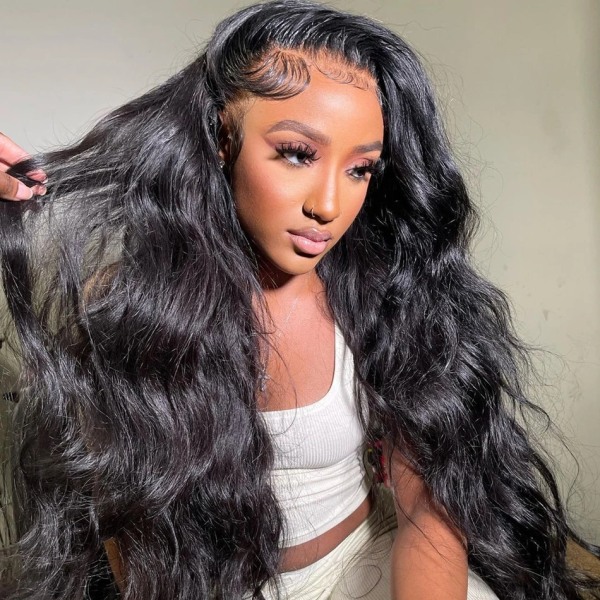 Brasiliansk 30 32 36 tum Body Wave 13x4 spets främre människohår peruk limlös Hd Transparent spets frontal peruk förplockad för kvinnor 13x4 Hd Lace Wig 26inches