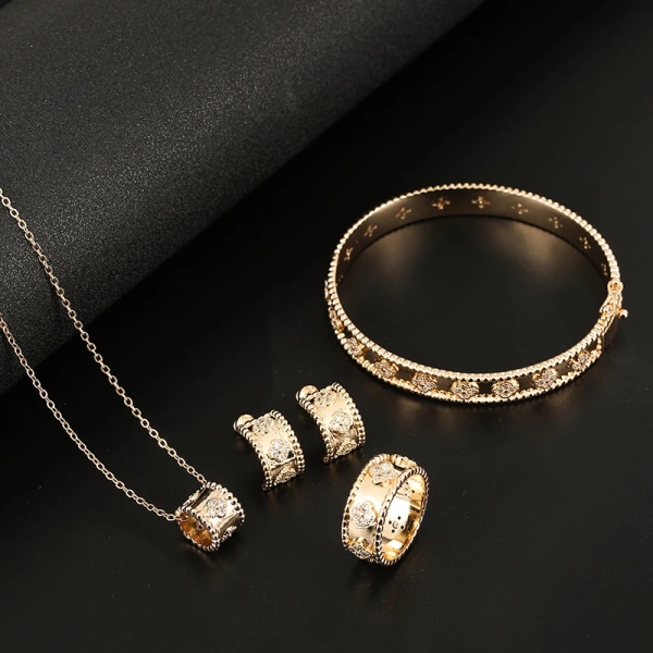 Kvinnors zirkonarmband Ring Örhänge Hänge Set med fyra högkvalitativa smycken Set Klassisk växt Blomma Modesmycken 6 TH81200-Platinum