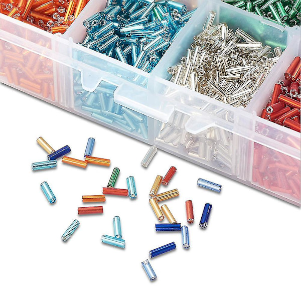 Liten ask med ca 3500 st 8 blandade färger silverkantade glaspärlor för smyckestillverkning, 6x1,8 mm