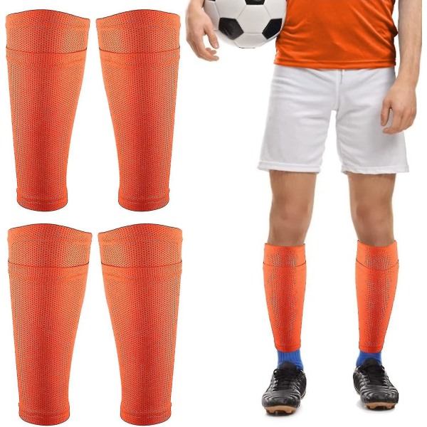 2 par pustende fotball leggbeskyttere med lomme, oransje, for barn