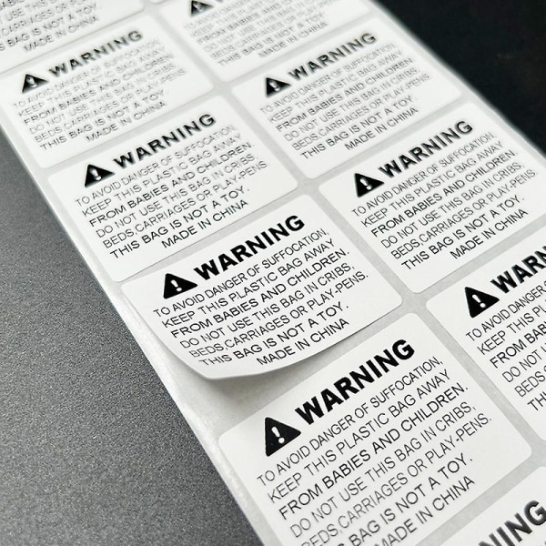 Tukehtumisen estävä varoitustarra, jossa on itsekiinnittyvä englantilainen itseliimautuva paperi (30x20MM, 100 tarraa)