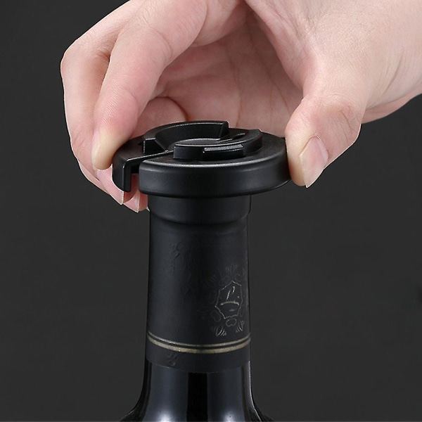 Kreativt legeringsmateriale Parodi ølflaskeåpner Husholdnings daglige kjøkkenverktøy（svart）