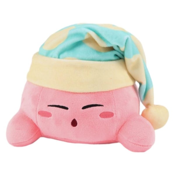 Kirby Small Doll Lastennukke makuuasennossa päällään hattu pehmolelu