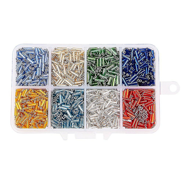 Liten ask med ca 3500 st 8 blandade färger silverkantade glaspärlor för smyckestillverkning, 6x1,8 mm