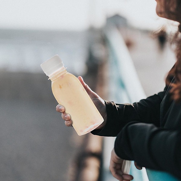 15 st Klar Mjölkflaskor Juiceflaskor med Lock Återanvändbara Smoothieflaskor Tomma Vattenflaskor