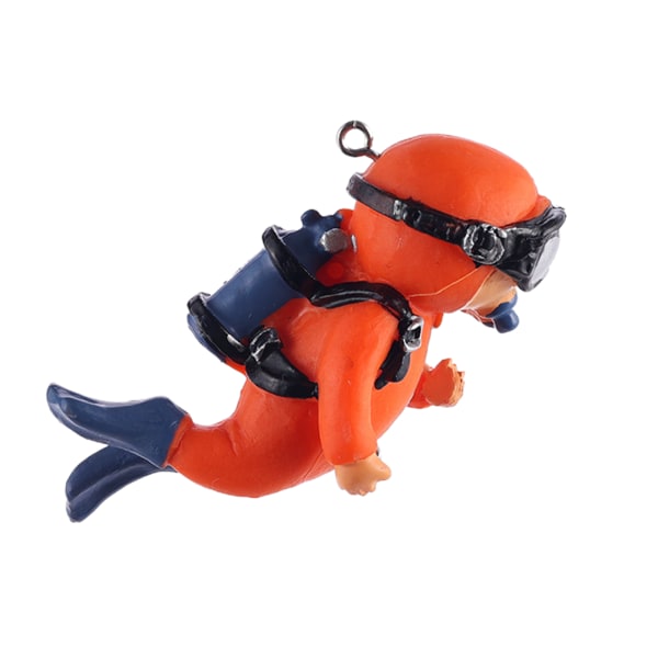 Miniatyr dykarfigur med klar kula och linjemålad kådadekor i harts orange
