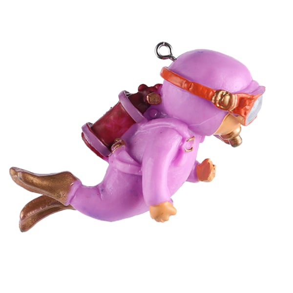 Miniatyr dykarfigur med klar kula och linjemålad kådadekor i harts purple