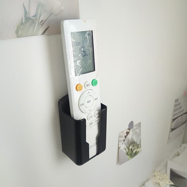 Wall-mounted remote control holder for TV and air conditioning