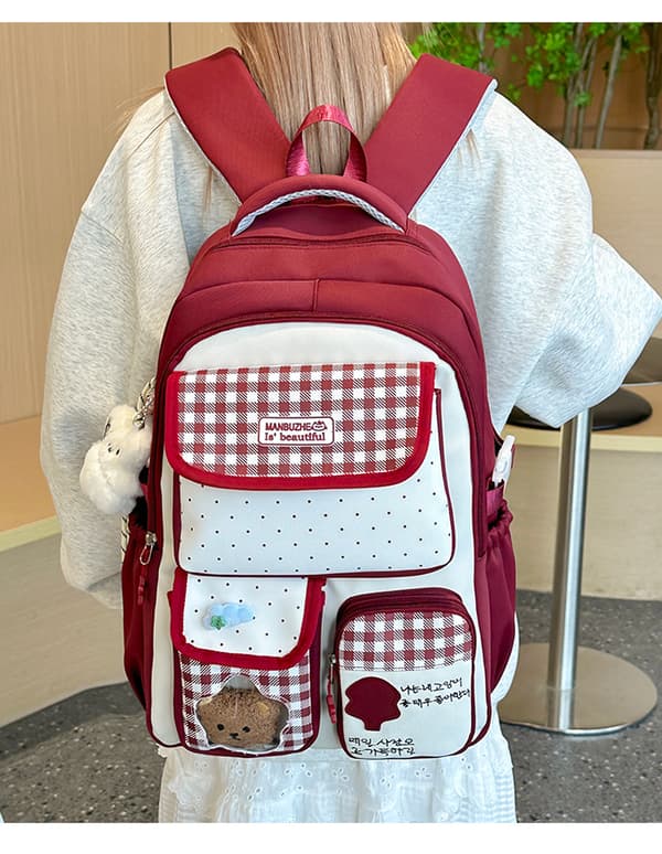 Backpack with Plaid and Polka Dot Pattern, Multiple Pockets, Cat Charm, and Spacious Storage for Everyday and Travel Green