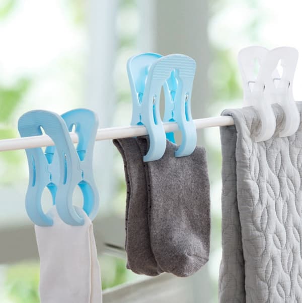 Blå sæt med 4 multifunktionelle tykke plastikklemmer