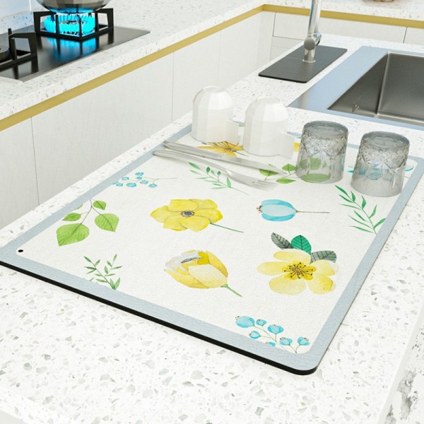 Gule blomster i Unison Superabsorberende oppvaskstativmatte for sett