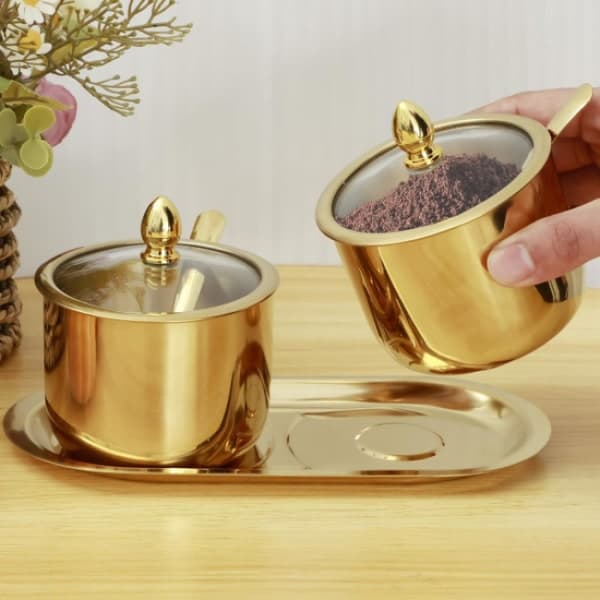 (guld) Sukkerskål i rustfrit stål med glaslåg, ske og bakke