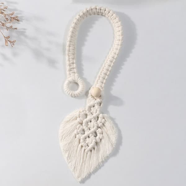 Set med 2 beige knappgardinbindningar, bladgardinbindningar, Ho