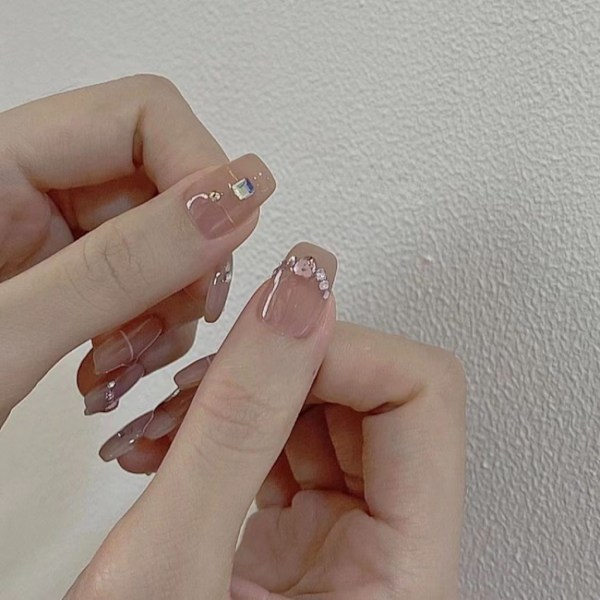 Isklar lotusrotpulver med diamanter och glittrande bärbar