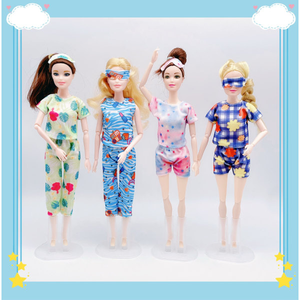 4 nukenvaatteita 4 pyjamaa, joissa päänauhat 11,5 tuuman nukelle