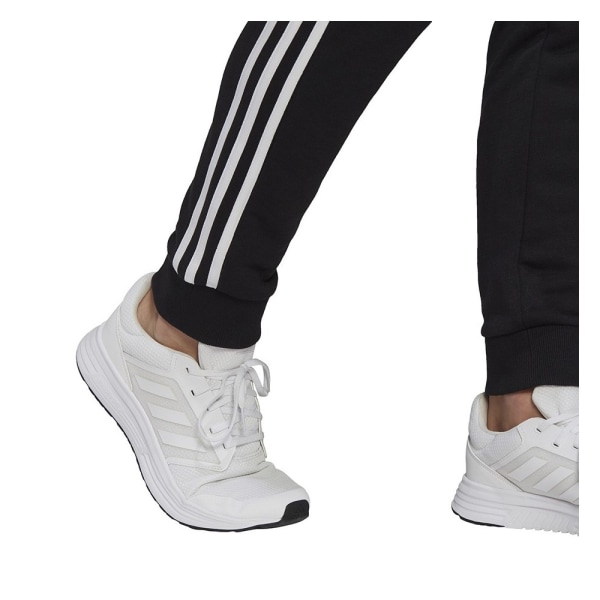 Byxor Adidas Essentials Tapered Cuff 3 Stripes Svarta 164 - 169 cm/S