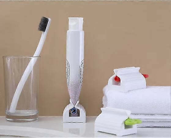 Set med 4 Blå Squeezer4 5.5 4cm - tandkräm med tre rullar, plasthållare, kosmetisk tandkrämsdispenser