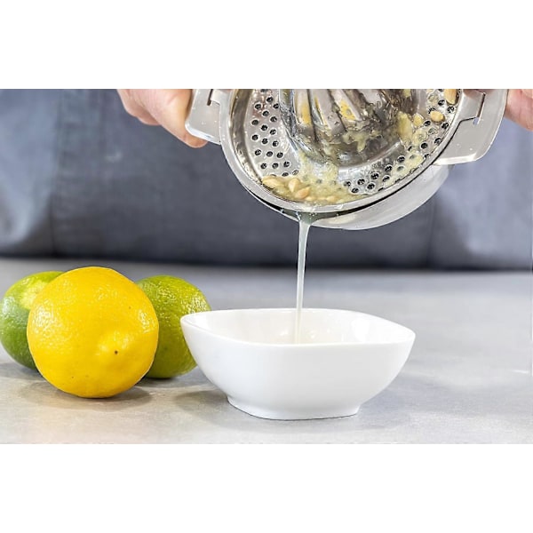 Citruspress i rostfritt stål - Droppfri pip &amp; Halkfri bas