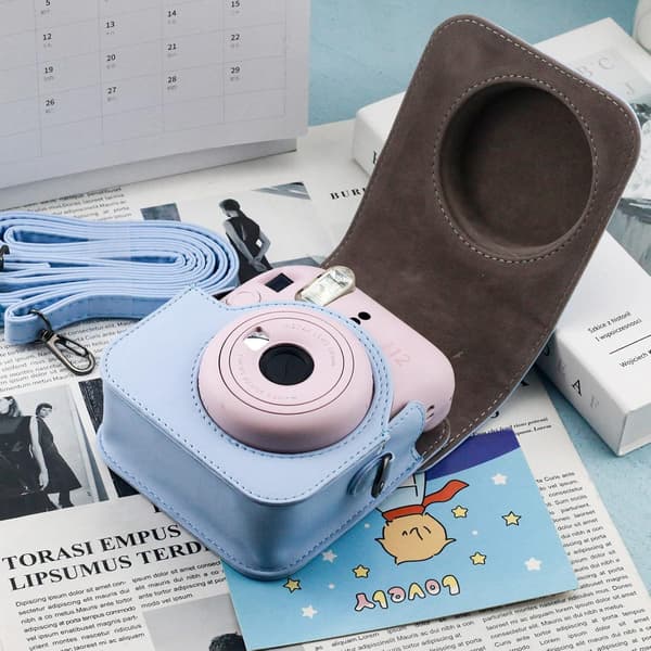 Fujifilm Instax Mini 12 -pikakamera ja kotelo 256 taskun valokuva-albumilla