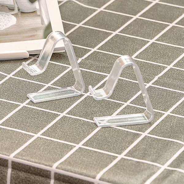 Transparenta bordsduksklämmor i plast, 12 stycken