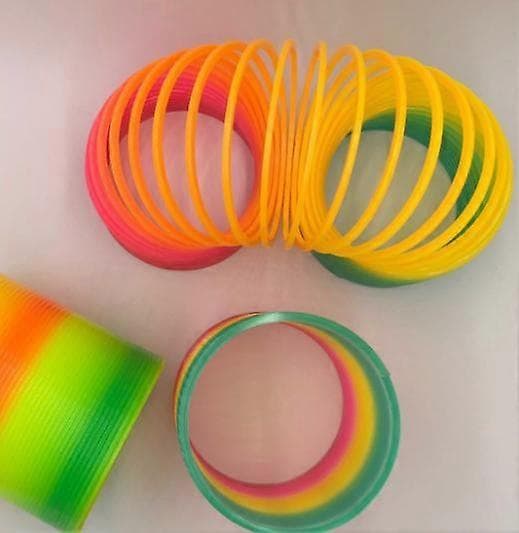 Dww-Leke for Barn / Regnbue Spiral / Materiale: Høyfast Plast / Dimensjoner: 8.7 x 9 cm
