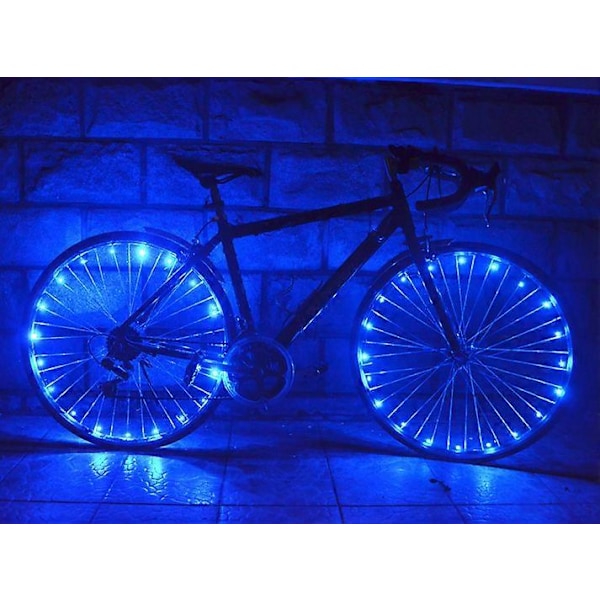 Blå pakke med 4 dæk LED cykelhjul lys med batterier inkluderet! Få 100% mere lys og synlighed fra alle vinkler for ultimativ sikkerhed