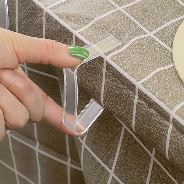 Transparenta bordsduksklämmor i plast, 12 stycken