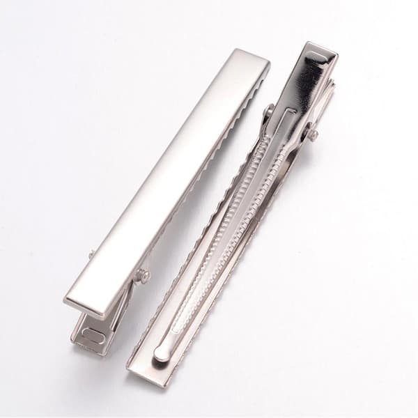 6 stk. sølvfargede hårklemmer, 7,7 cm lange og 9 mm brede