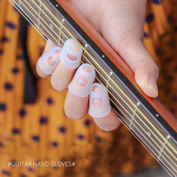 Guitarstreng 2 x 6 stk. med 4 fingerbeskyttere