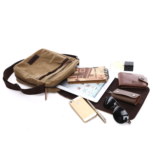 Sporty crossbody taske i canvas og læder Svart