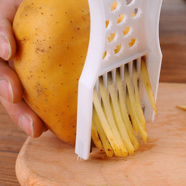 Hem köksredskap grönsak frukt potatis er parer julienne ter
