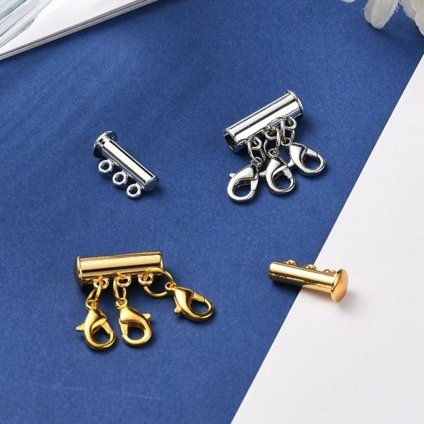 Monirivinen kaulakorun selvityslaite, monirivisen kaulakorun selvitys, kerroskaulakorun lukko Silver 2