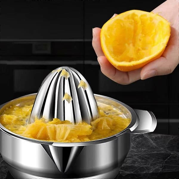 Manuel appelsinpresser med si til appelsiner