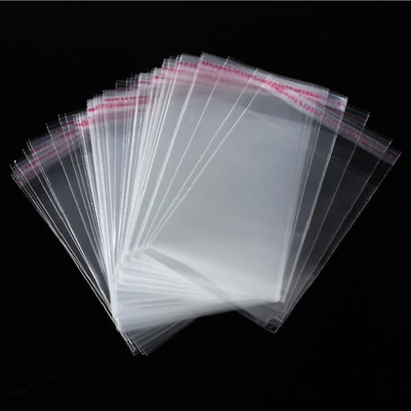 100 st Transparenta Självhäftande Förseglade Plastpåsar Smycken Presentförpackning 9*13cm