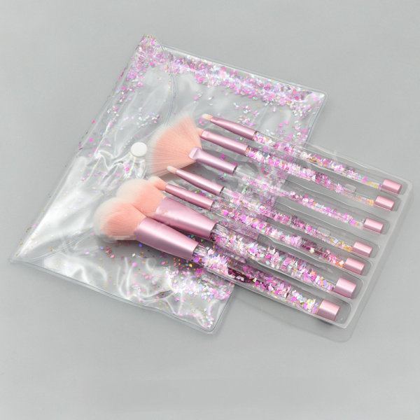 Sett med 7 sminkborstar med partikelhandtag i klarkristall med flytende artikler med kvicksand, set Skönhetssminkverktøy (stil 1)
