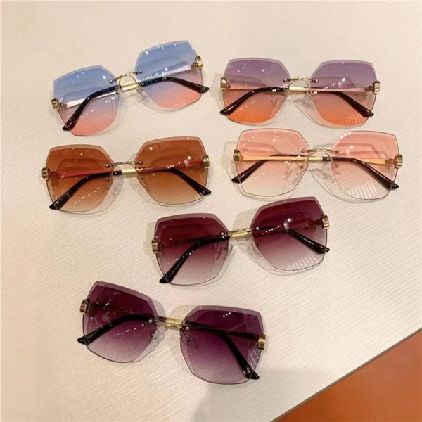 Solglasögon för kvinnor, havslinser, kantskärning, fashionabla