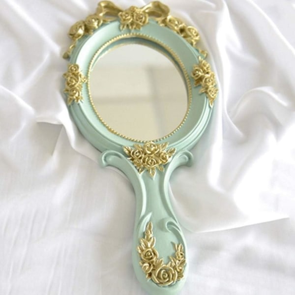 Grøn vintage håndspegel sminkspegel med håndtag antik
