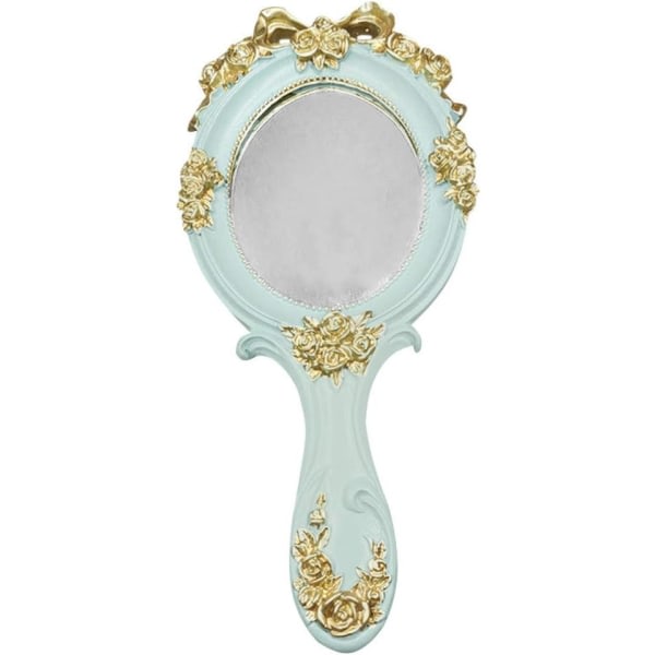Grön vintage håndspegel sminkspegel med håndtag antik